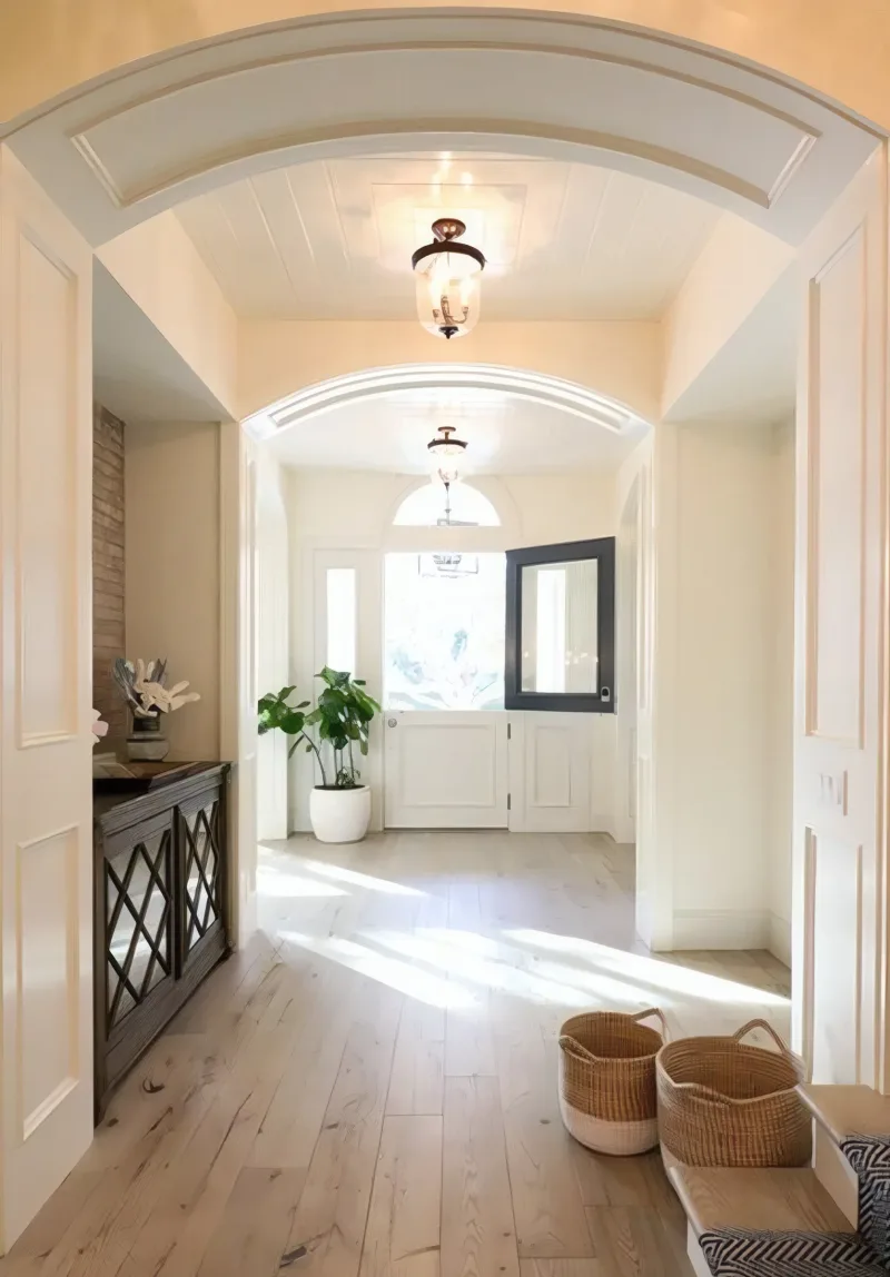 Custom luxury home entryway in One Ford Road, Newport Beach built by Drake Construction
